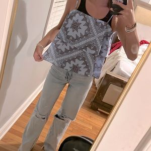 Super cute blue top with a red print on it